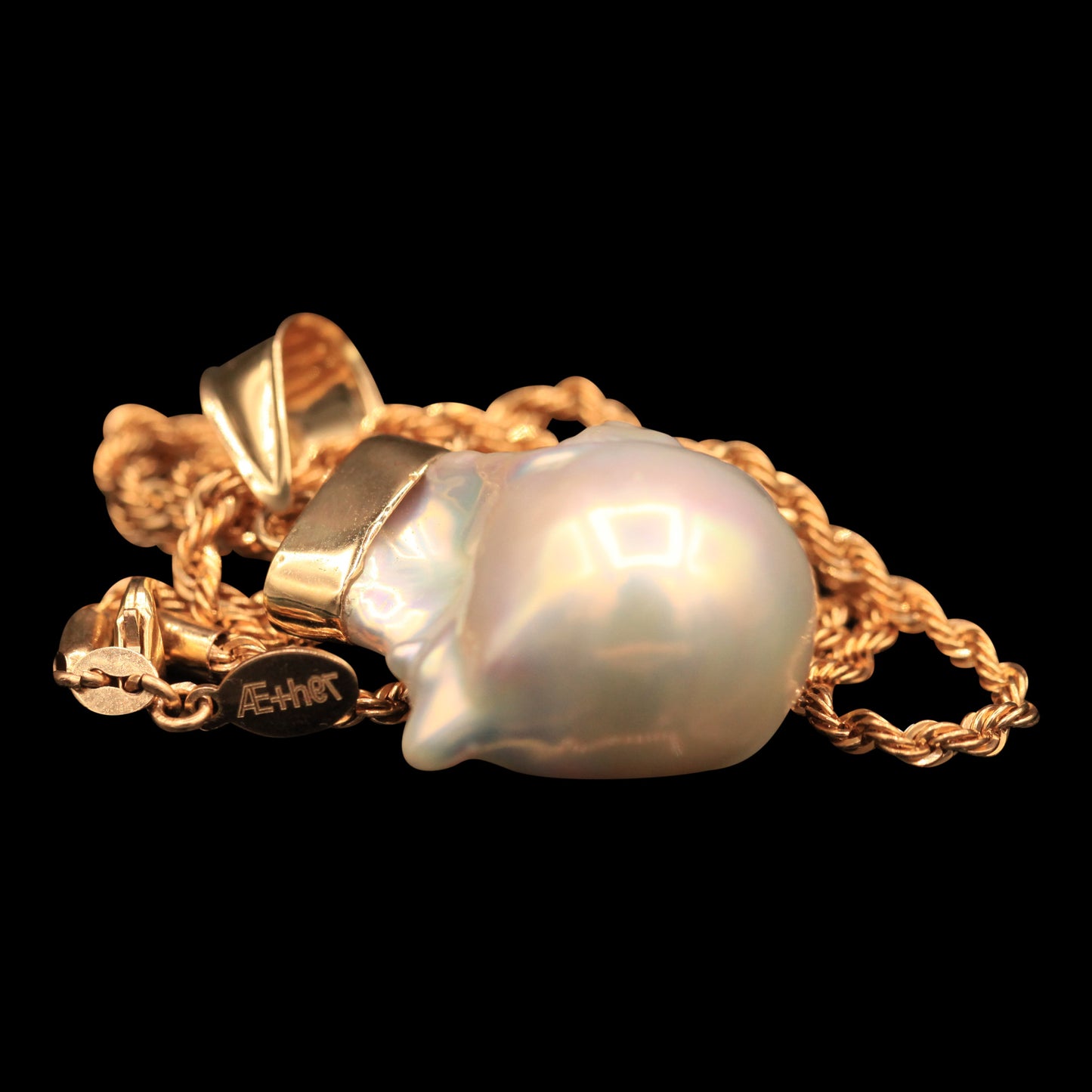 43.4 CARAT FRESHWATER BAROQUE PEARL ON 14K ROPE