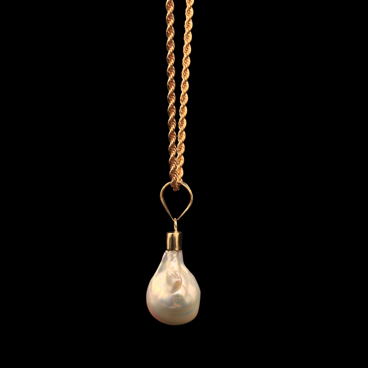 43.4 CARAT FRESHWATER BAROQUE PEARL ON 14K ROPE