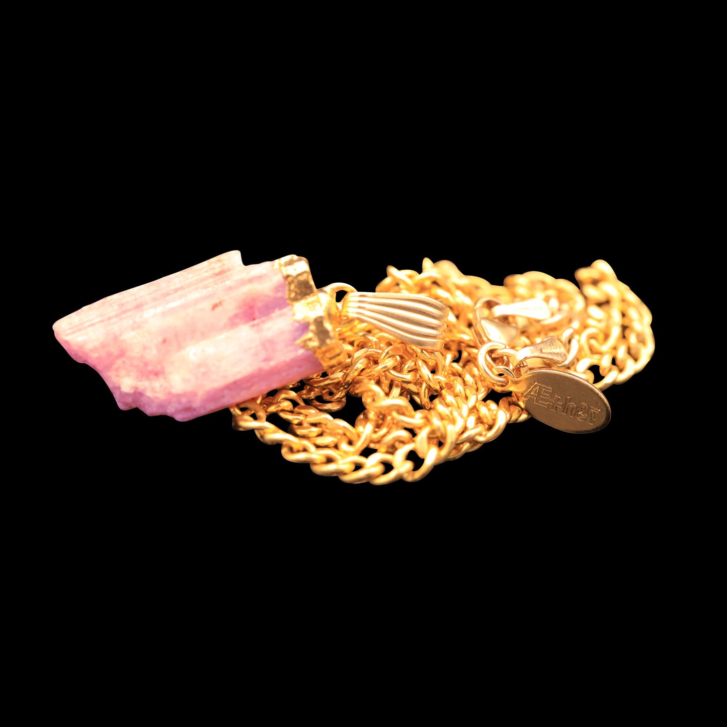 Raw Pink Tourmaline on Curb