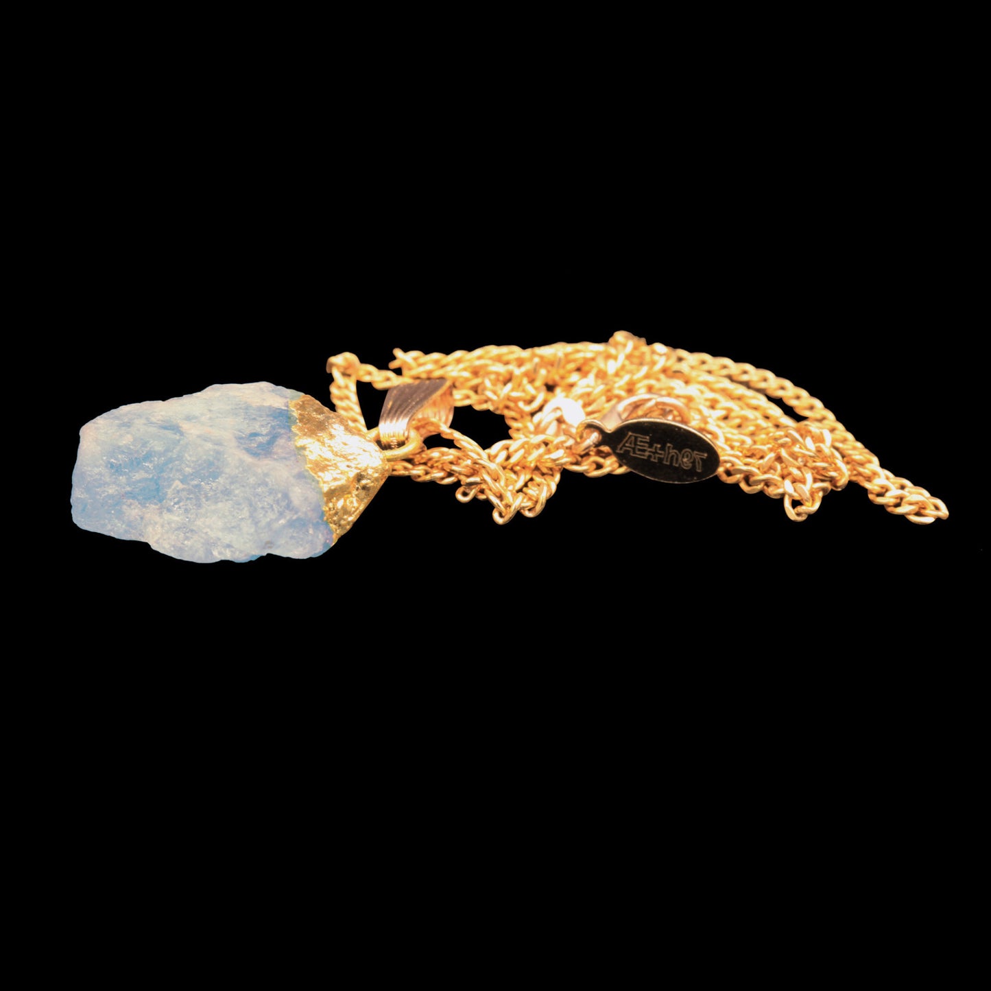 Raw Aquamarine Point on Curb