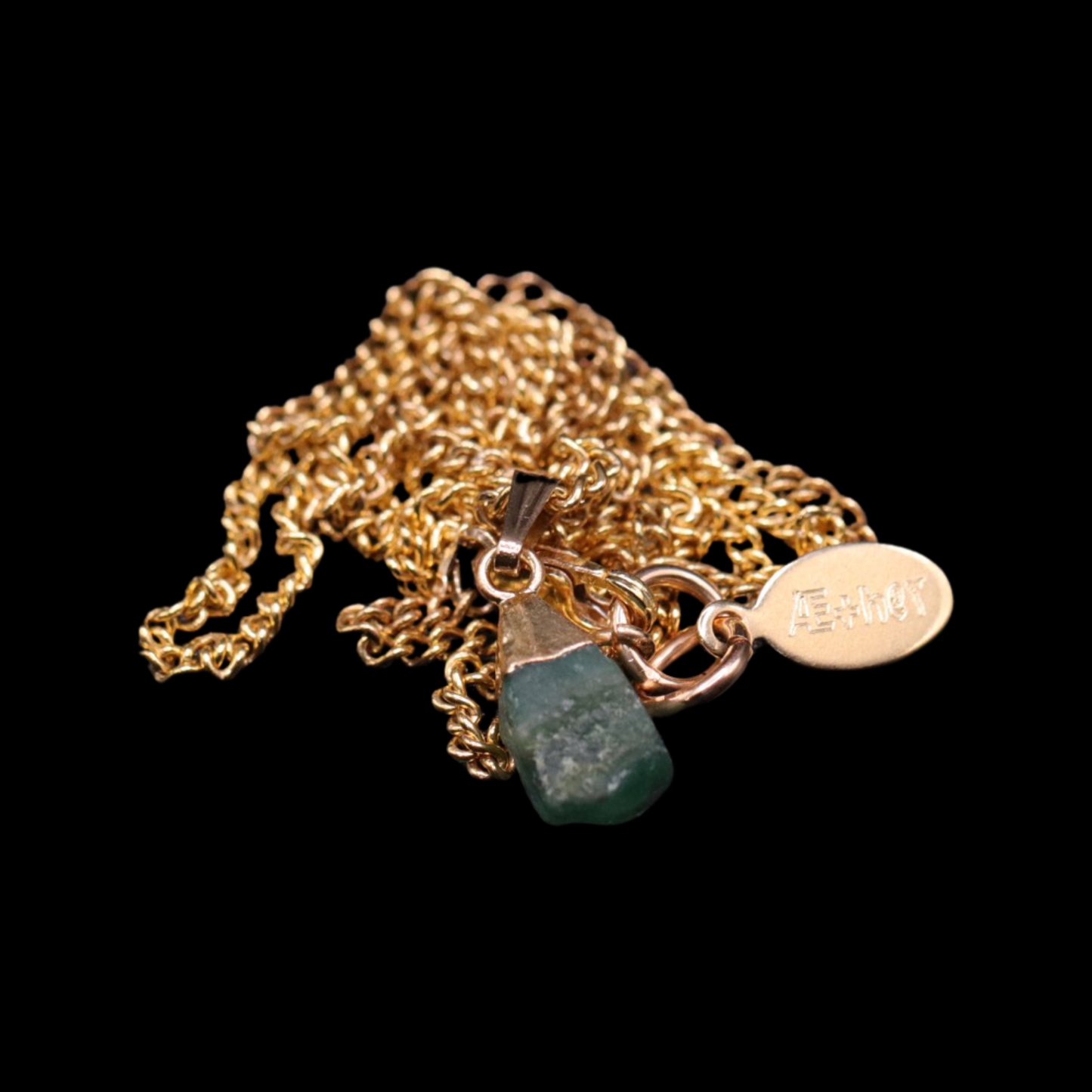 Ultra Petite Raw Emerald on Curb