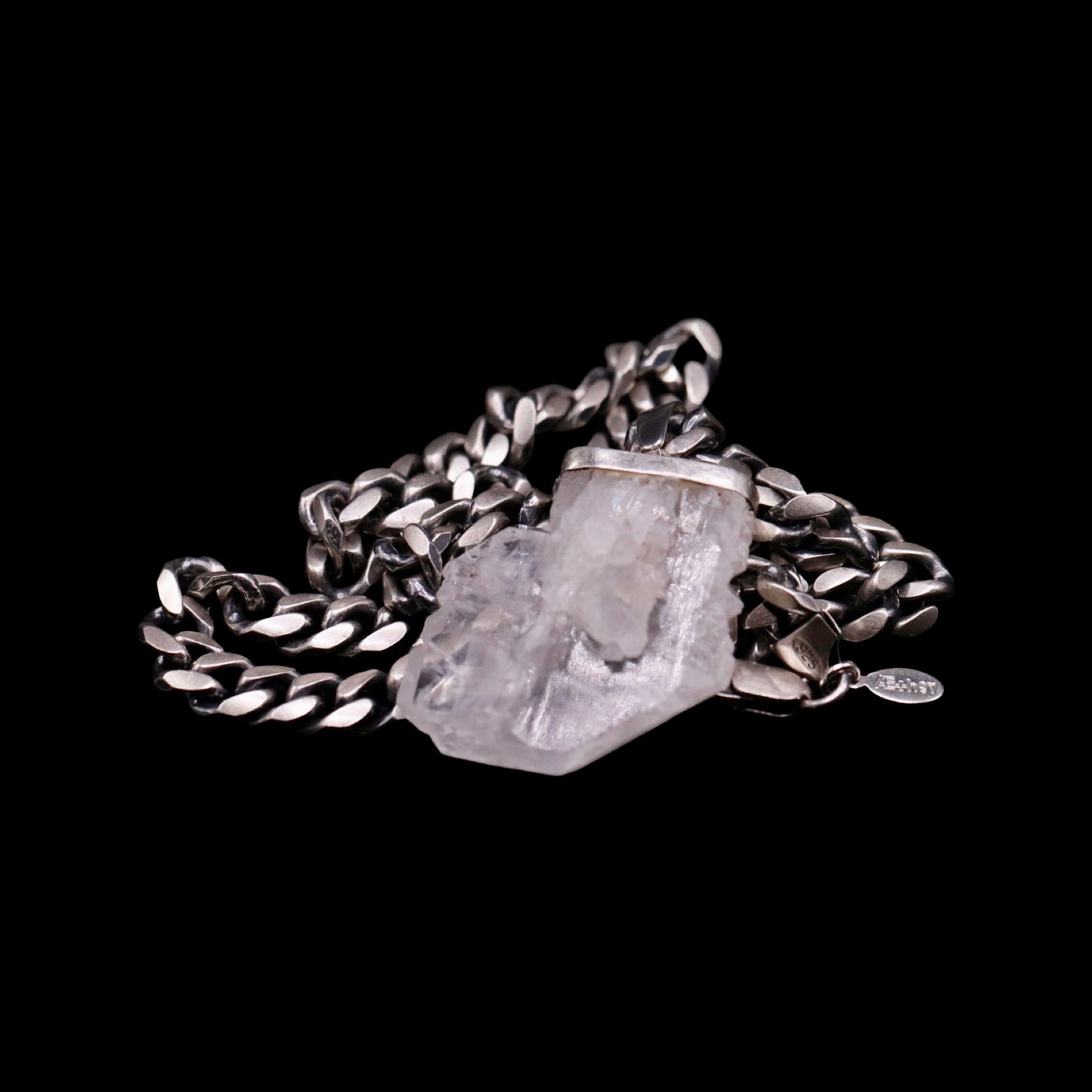 Raw Clear Quartz Cluster on Gunmetal Curb