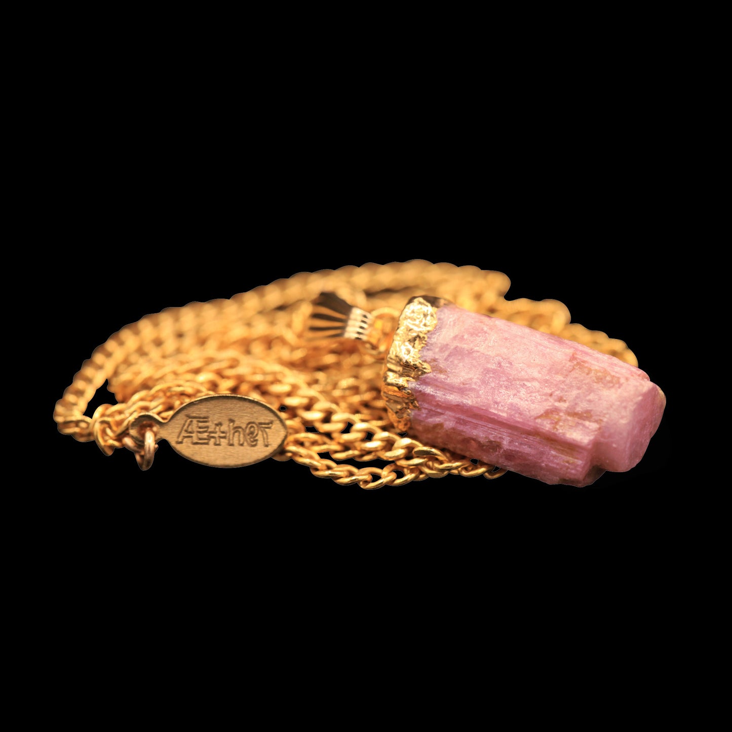 Raw Pink Tourmaline on Curb