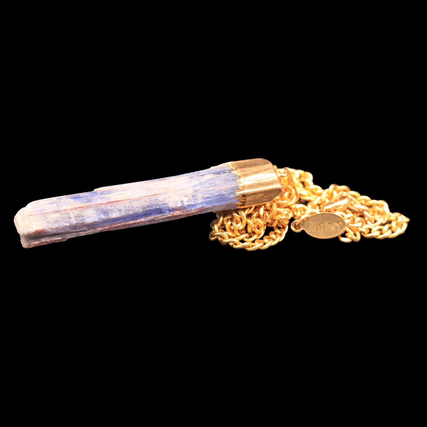 Raw Blue Kyanite Blade on Curb