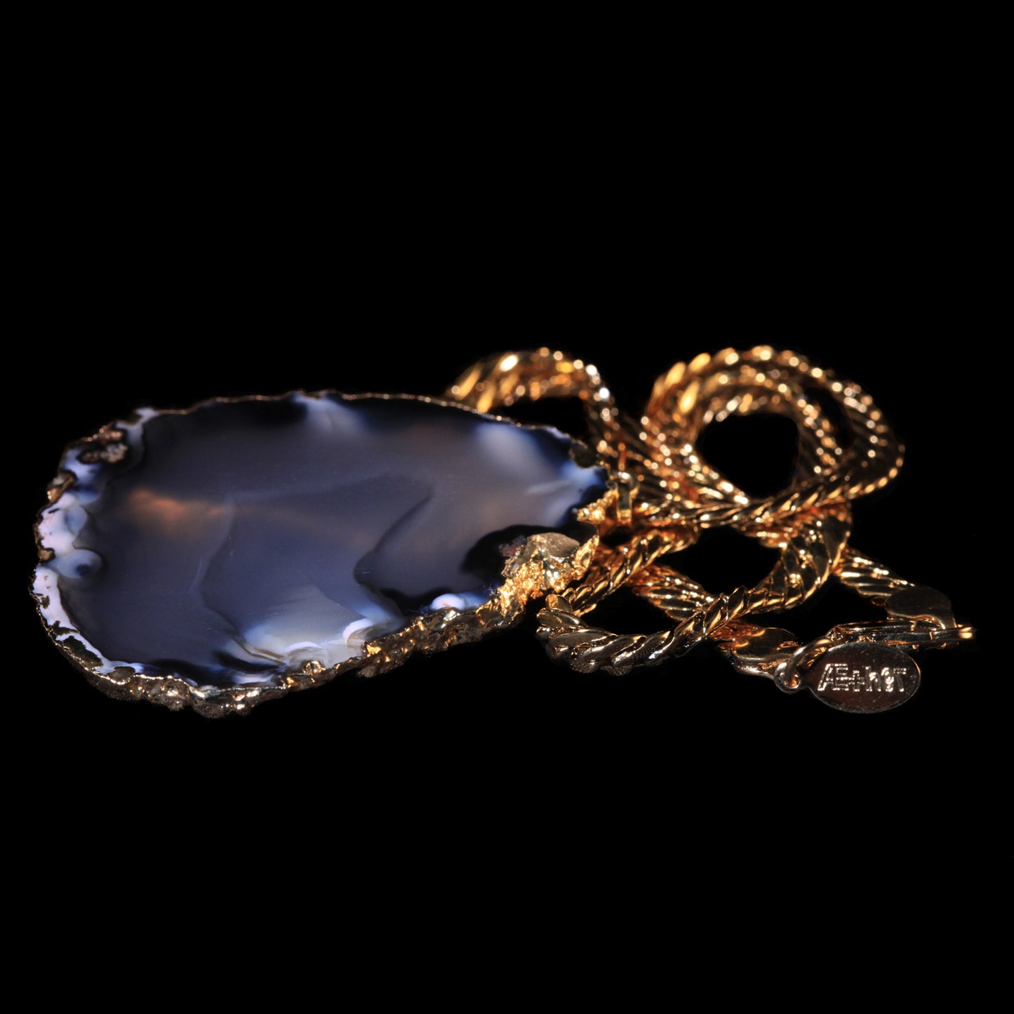 Transparent Black Agate Slice on Herringbone