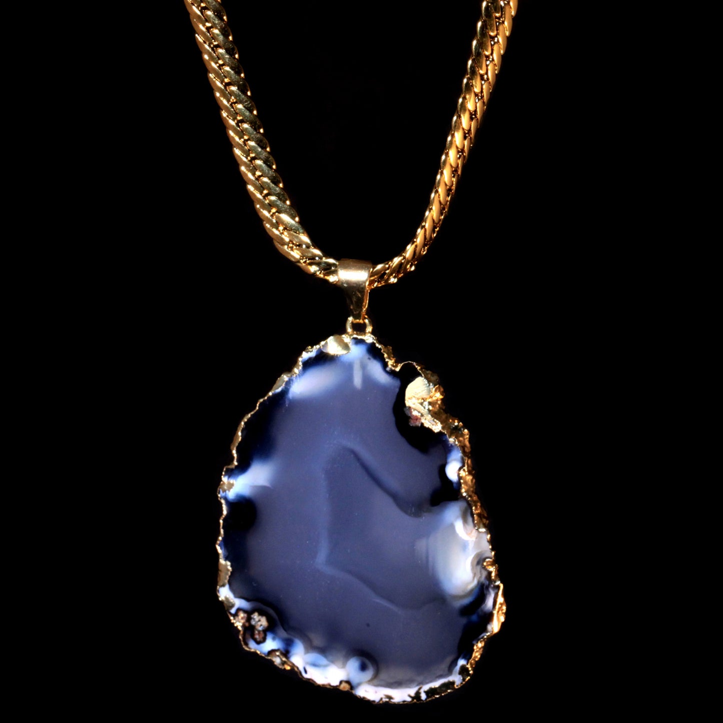 Transparent Black Agate Slice on Herringbone