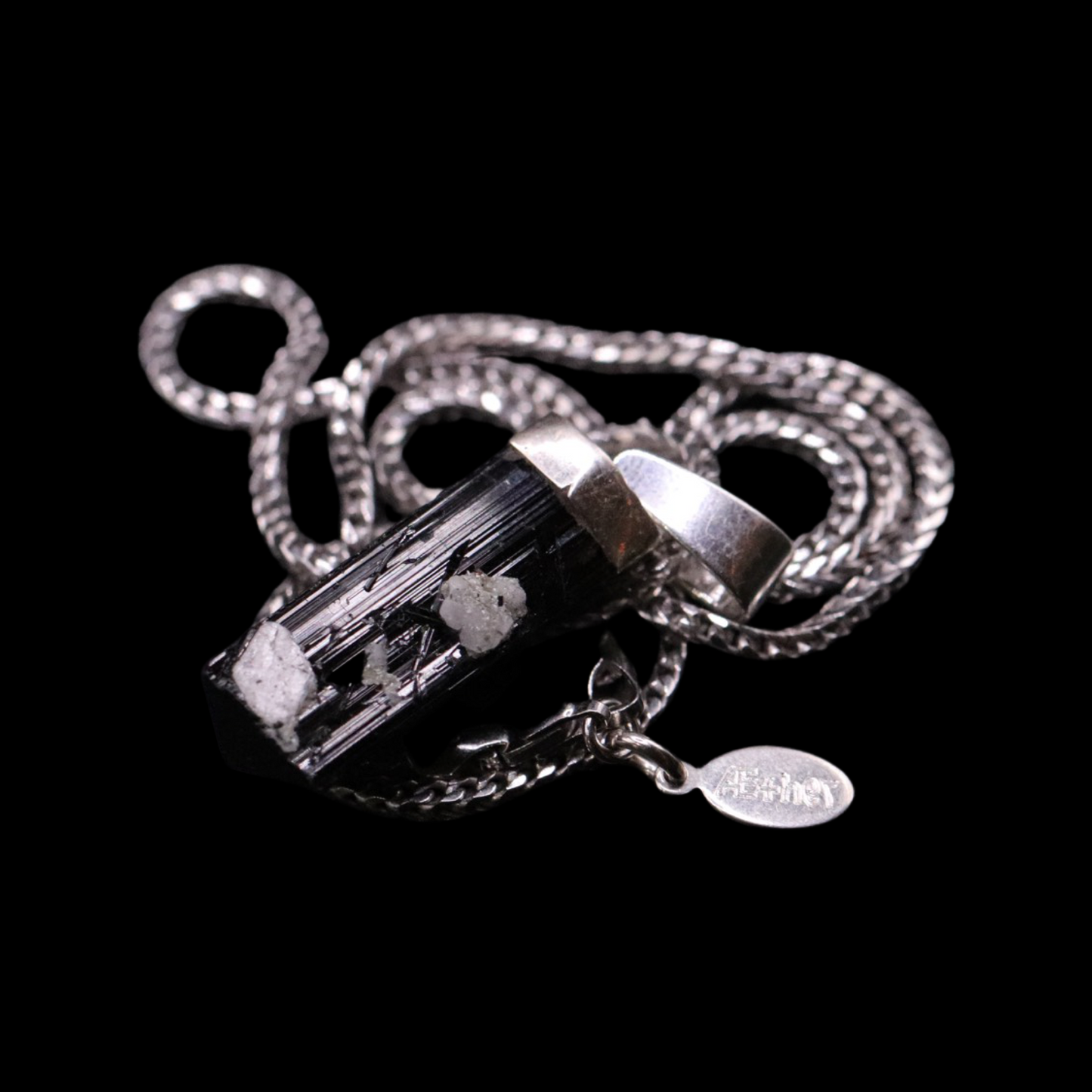 Raw Black Tourmaline with Quartz Inclusions on Franco