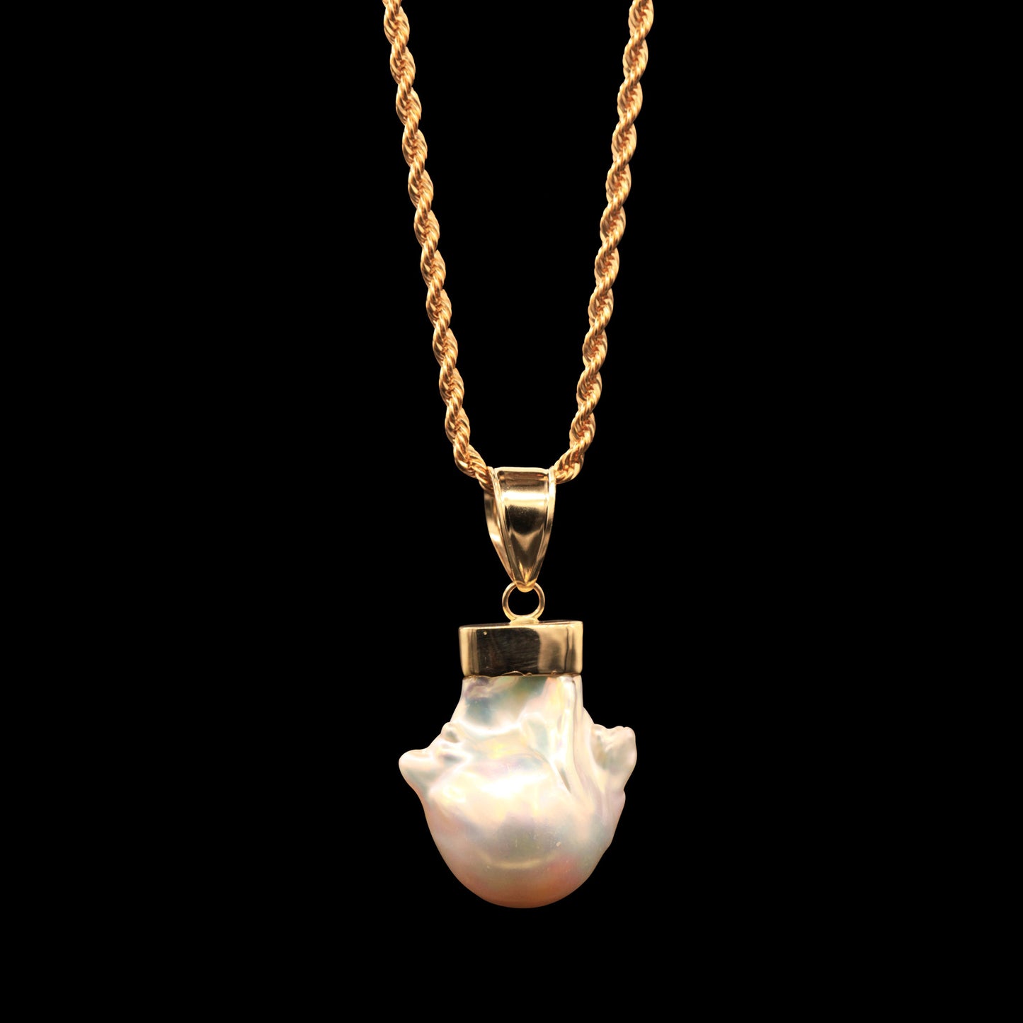 43.4 CARAT FRESHWATER BAROQUE PEARL ON 14K ROPE