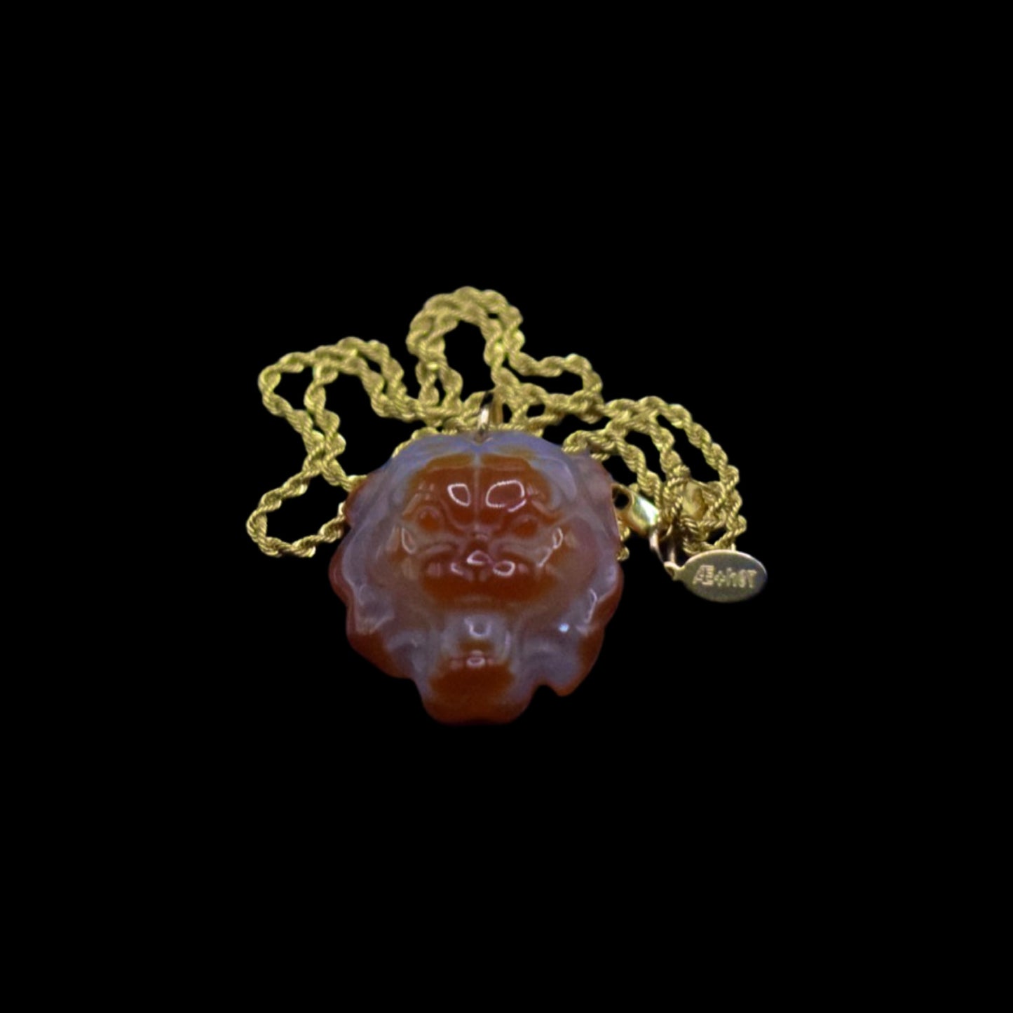 Carved Lion Agate on Rope